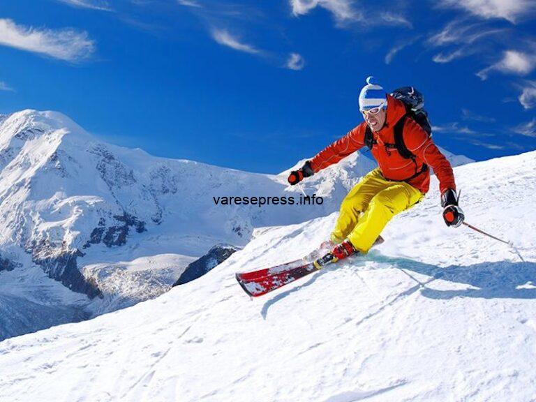 sciatore sci montagna